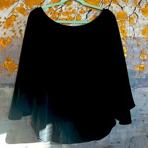 Scoop neck Black blouse with long flutter sleeve.